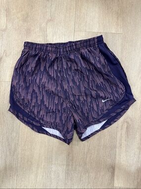 Nike Women's Purple Patterned Athletic Shorts with Pink Accents